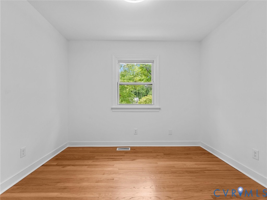 7361 Creek Ridge Road Henrico, VA 23231 - Photo 27 of 51 Wood-finish flooring with white trim and a single