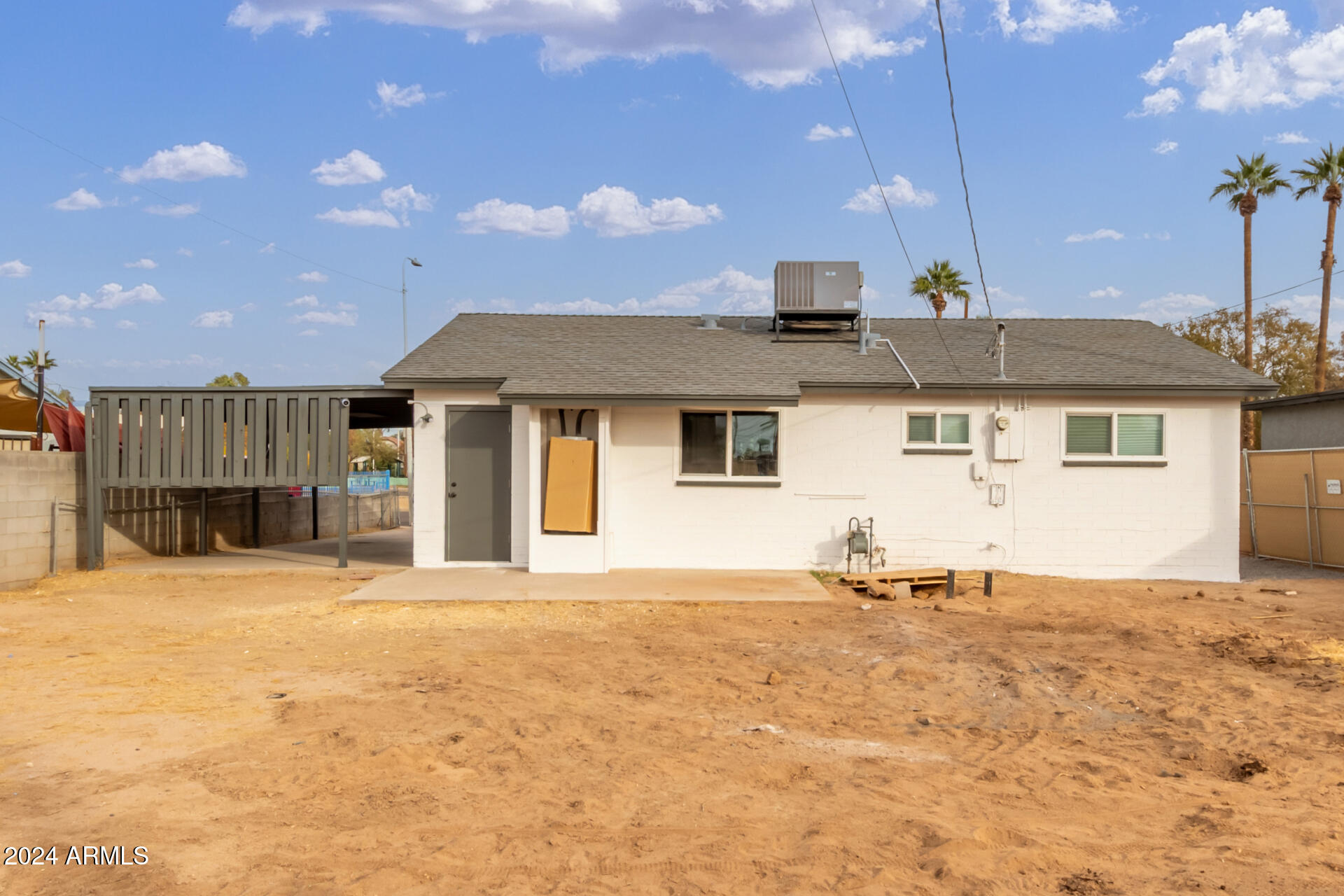 5818 South 20th Street Phoenix, AZ 85040 - Photo 24 of 29 a view of a house with a patio