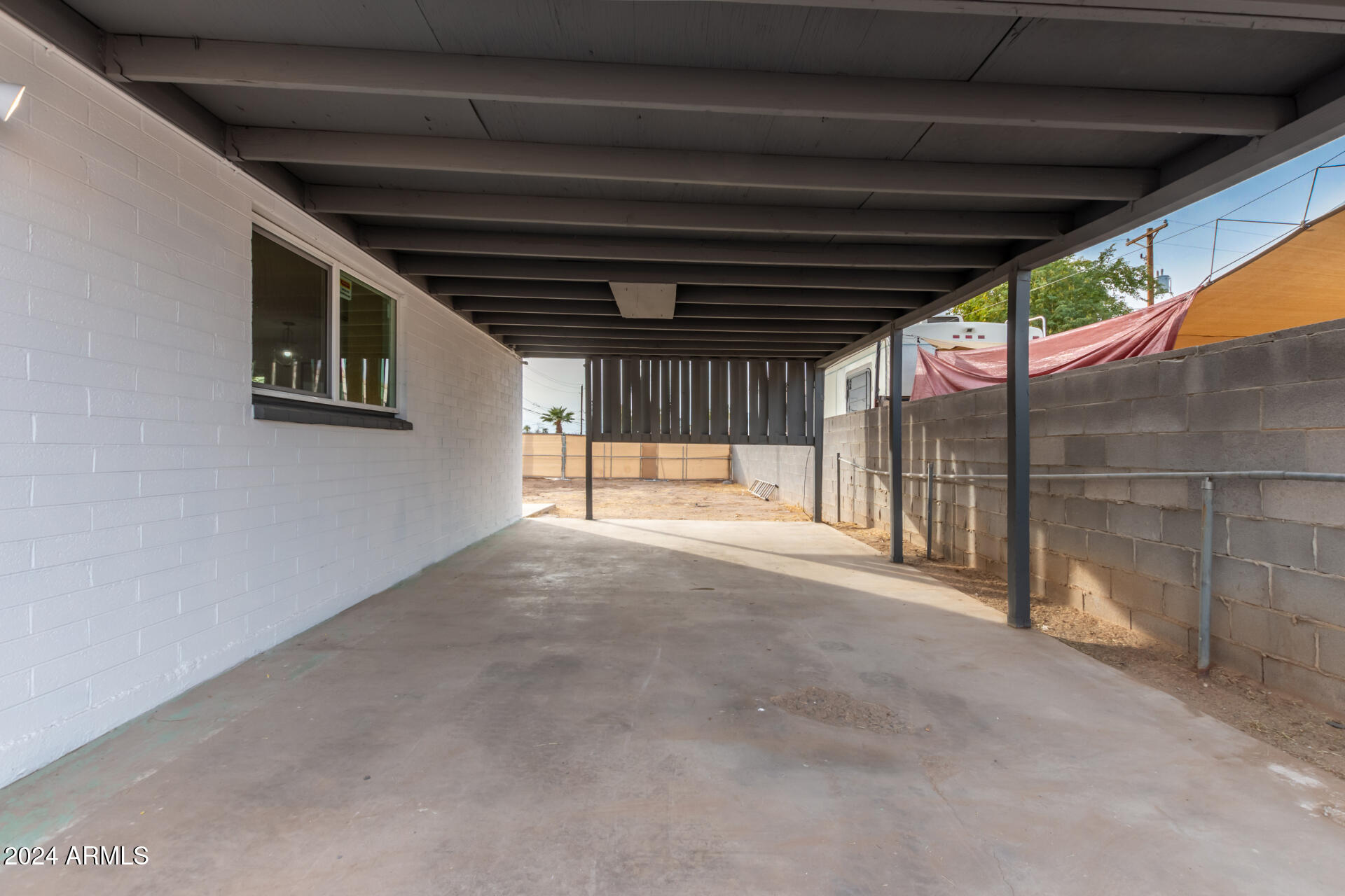 5818 South 20th Street Phoenix, AZ 85040 - Photo 5 of 29 a view of an empty room with a window