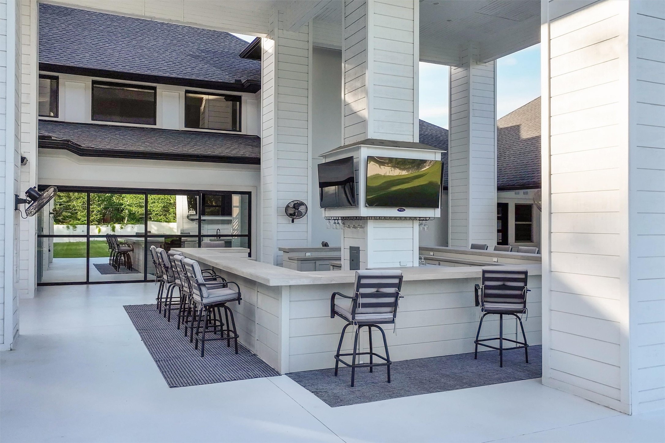 1907 Woerner Road Houston, TX 77090 - Photo 47 of 50 The perfect place to entertain! Plus there is convenient access to back patio from the dining room, and utility space.