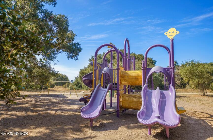 384 Falcon Crest Drive Lompoc, CA 93436 - Photo 15 of 22 a view of a park with iron fence