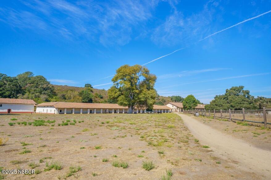 384 Falcon Crest Drive Lompoc, CA 93436 - Photo 21 of 22 a view of a lake with a big yard
