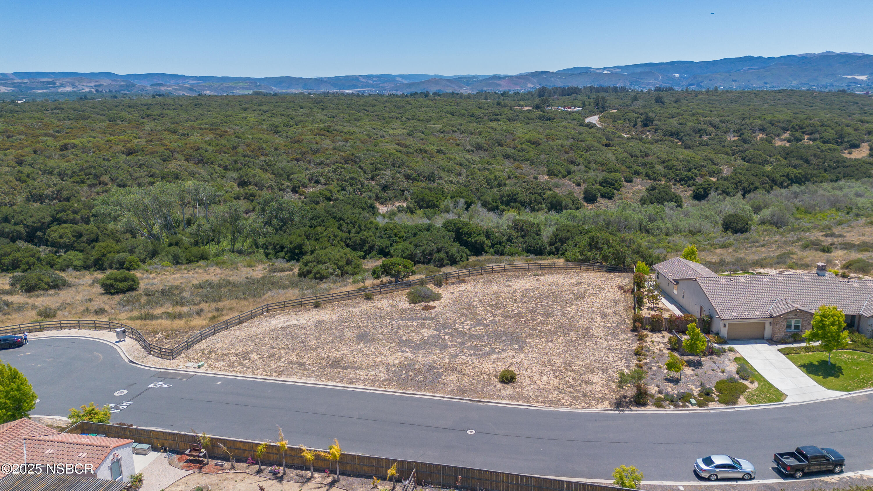 384 Falcon Crest Drive Lompoc, CA 93436 - Photo 6 of 22 a view of a yard with a barn