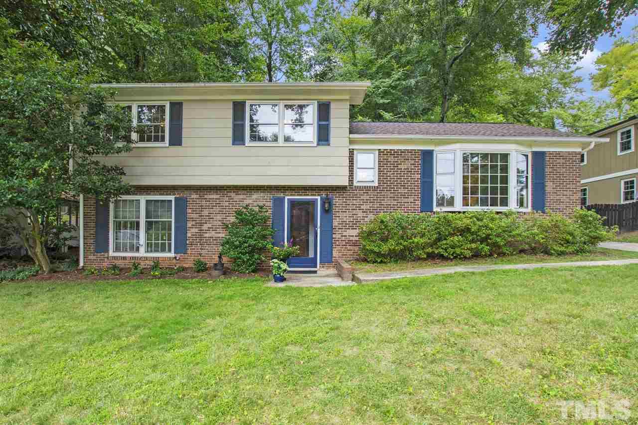 4605 Latimer Road Raleigh, NC 27609 - Photo 1 of 30 a front view of a house with a yard
