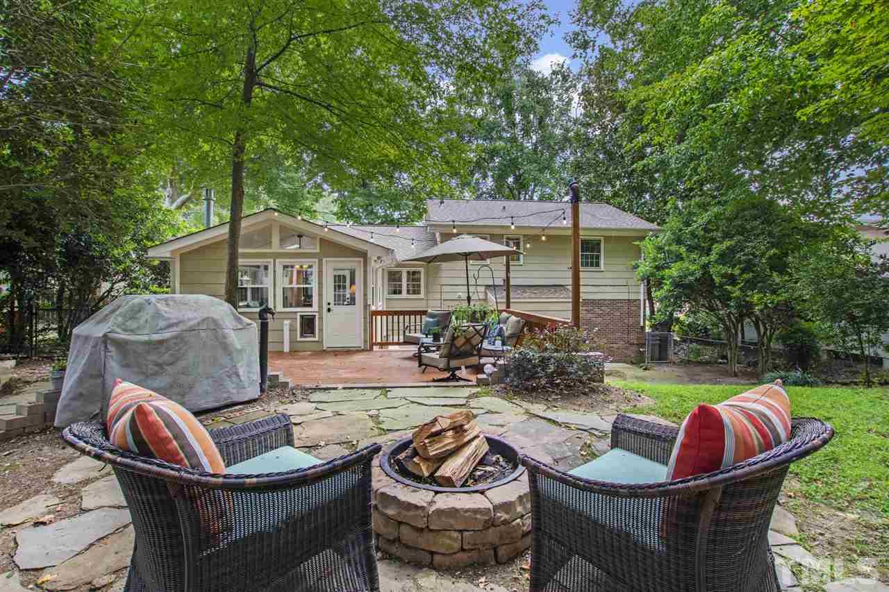 4605 Latimer Road Raleigh, NC 27609 - Photo 26 of 30 a backyard of a house with yard table and chairs