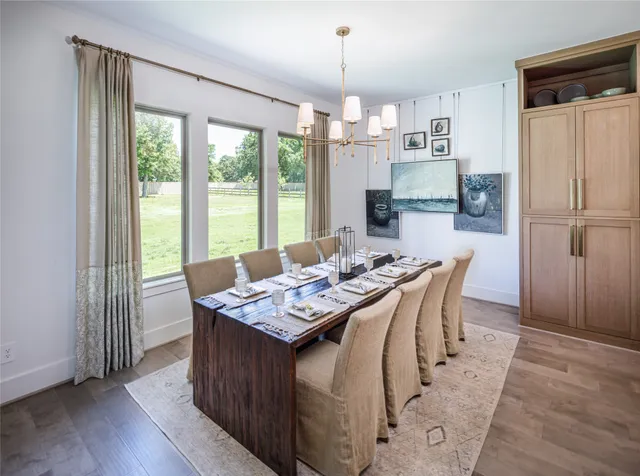 a view of a swimming pool with a yard