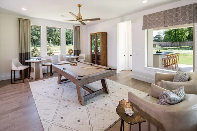 a view of a park with large trees