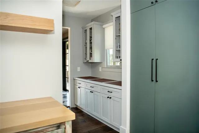 a view of a hallway view with staircase