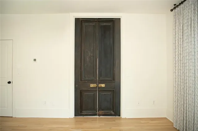 a view of a bathroom with a shower and a sink