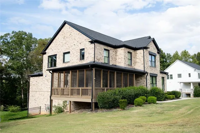 a view of a porch with a floor to ceiling window