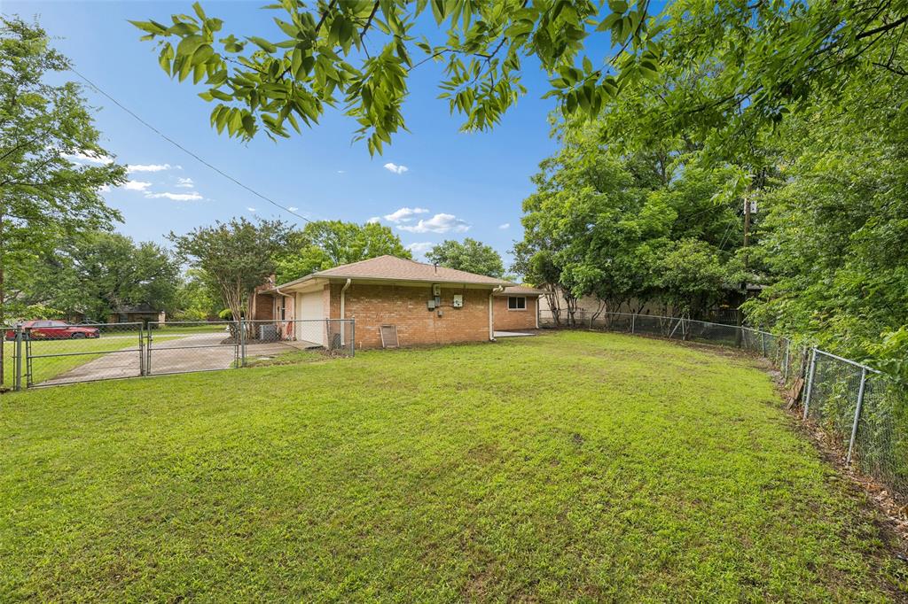1548 Timbercreek Drive Howe, TX 75459 - Photo 23 of 24 a backyard of a house with lots of green space