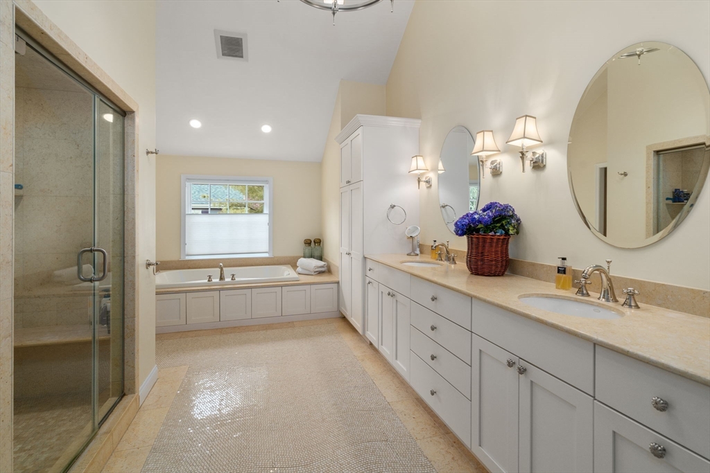 37 Oakridge Road Wellesley, MA 02481 - Photo 23 of 39 a bathroom with a double vanity sink mirror and shower