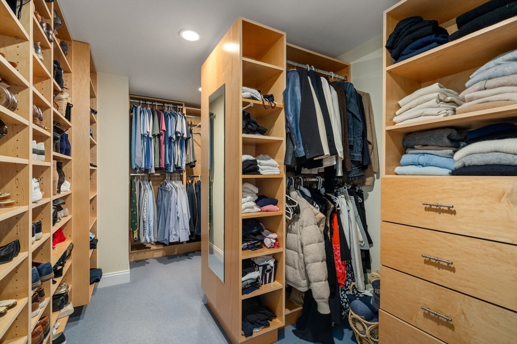 37 Oakridge Road Wellesley, MA 02481 - Photo 24 of 39 a view of walk in closet with clothes and shoes