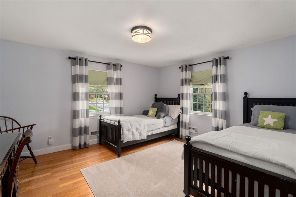 37 Oakridge Road Wellesley, MA 02481 - Photo 28 of 39 a bedroom with a bed and a window