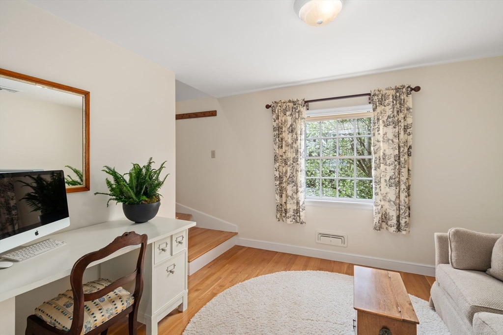 37 Oakridge Road Wellesley, MA 02481 - Photo 31 of 39 a living room with furniture and a potted plant