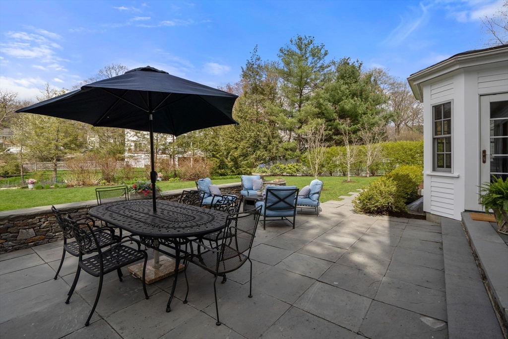 37 Oakridge Road Wellesley, MA 02481 - Photo 35 of 39 a view of an outdoor sitting area with furniture and garden