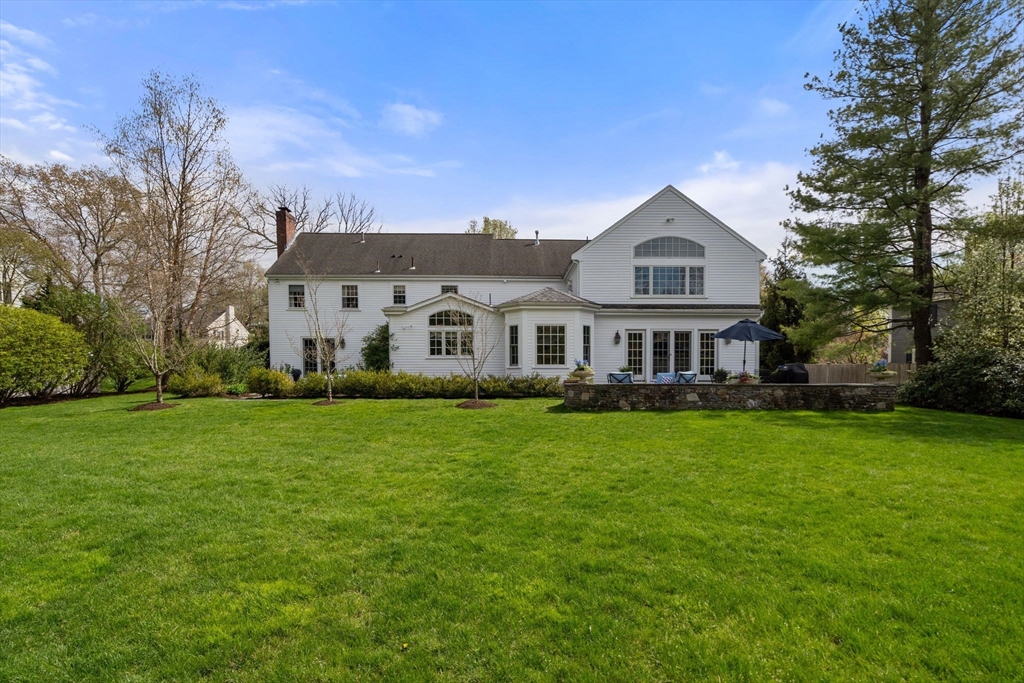 37 Oakridge Road Wellesley, MA 02481 - Photo 38 of 39 a view of a house with a big yard
