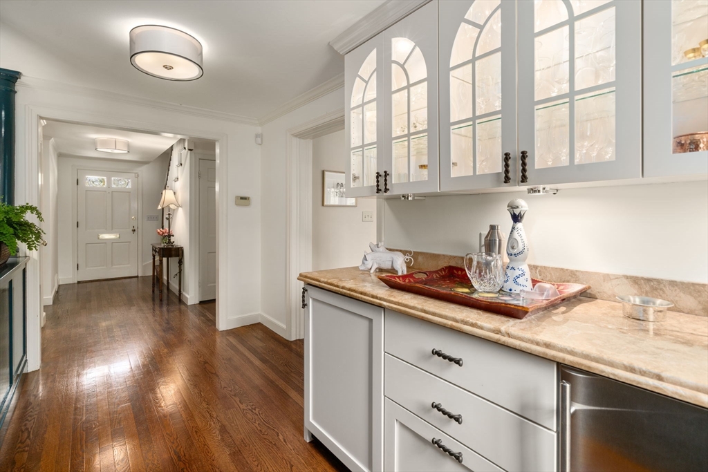 37 Oakridge Road Wellesley, MA 02481 - Photo 6 of 39 a kitchen with a sink and cabinets