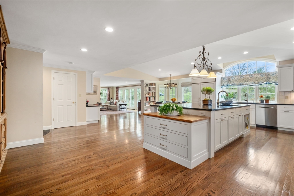 37 Oakridge Road Wellesley, MA 02481 - Photo 10 of 39 a kitchen with stainless steel appliances granite countertop a stove and cabinets