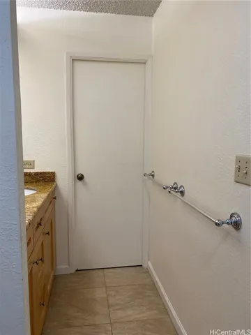 a bathroom with a sink and washing machine