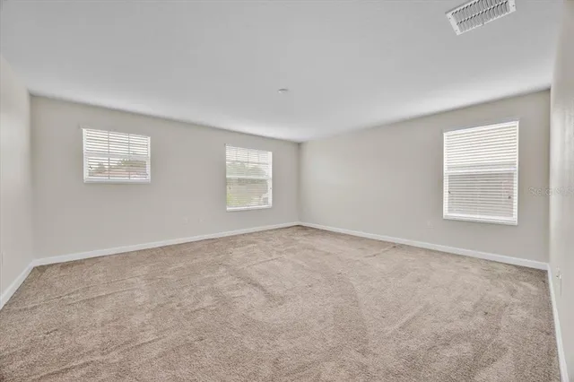 a bathroom with a double vanity sink mirror and double