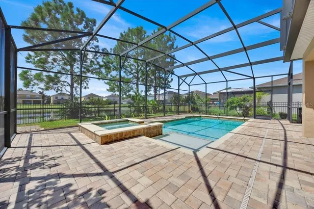 a view of yard with a large trees