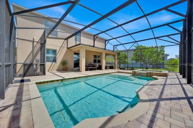 a view of yard with patio