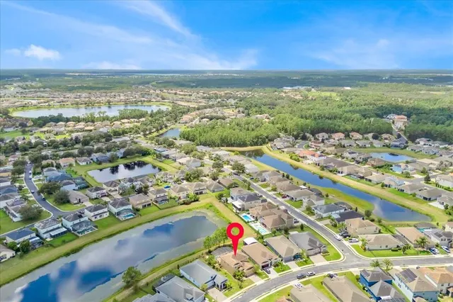 an aerial view of an house swimming pool and outdoor space