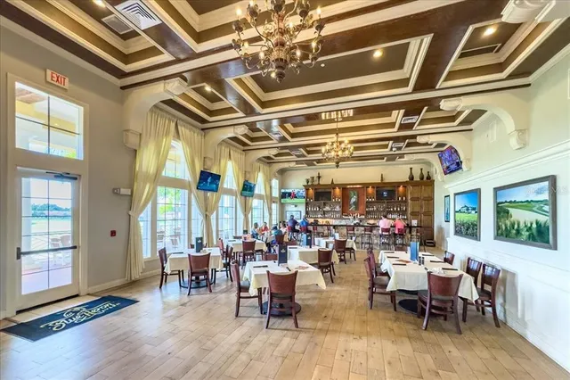 a front view of a house with a yard and outdoor space