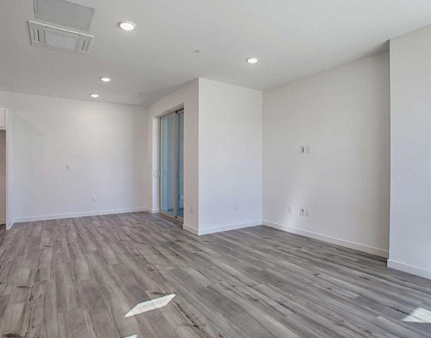 6705 Optimum Loop San Jose, CA 95119 - Photo 11 of 19 a view of room with wooden floor