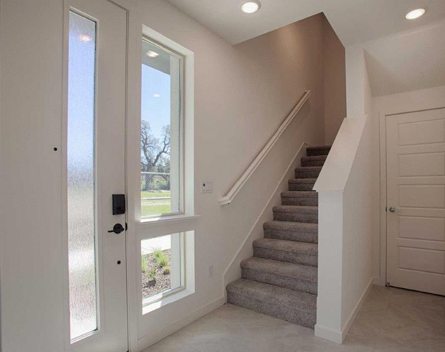 6705 Optimum Loop San Jose, CA 95119 - Photo 4 of 19 a view of entryway with wooden floor and windows