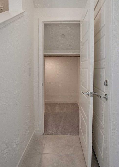 6705 Optimum Loop San Jose, CA 95119 - Photo 6 of 19 a bathroom with a glass door shower