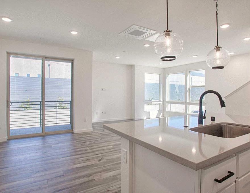 6705 Optimum Loop San Jose, CA 95119 - Photo 9 of 19 a bathroom with a sink and a large window
