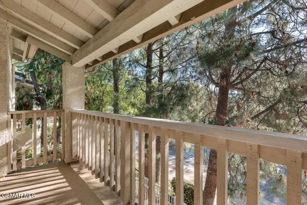 a view of a wooden fence