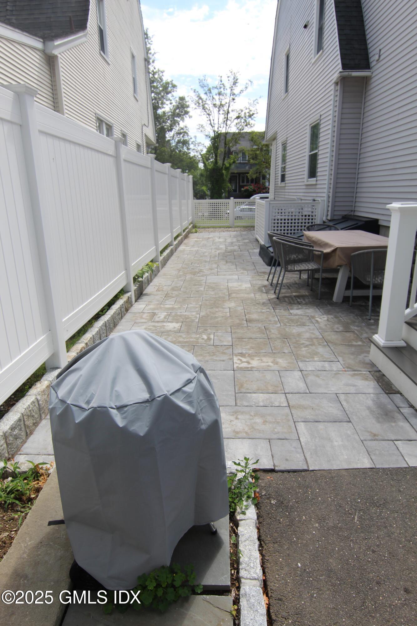 32 Ridge Street, Unit 2 Greenwich, CT 06830 - Photo 13 of 19 a view of a backyard of the house