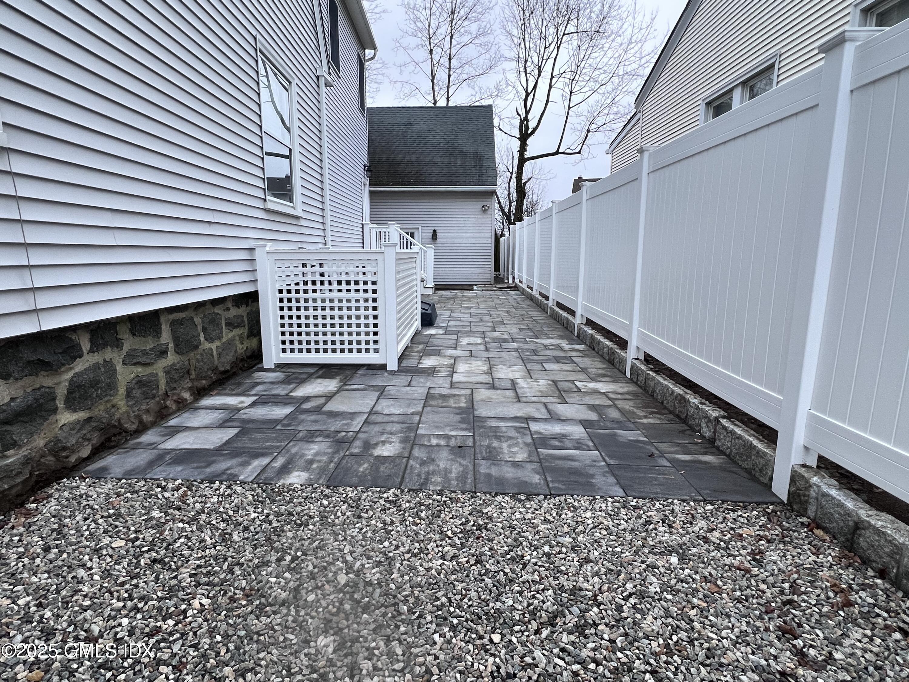 32 Ridge Street, Unit 2 Greenwich, CT 06830 - Photo 14 of 19 a view of a backyard with a small cabin