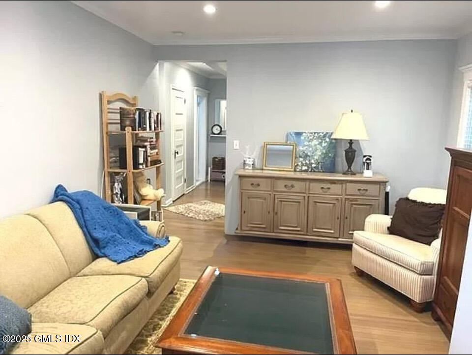 32 Ridge Street, Unit 2 Greenwich, CT 06830 - Photo 4 of 19 a living room with furniture and a couch