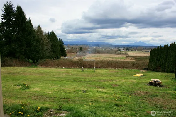 a view of a golf course with a lake