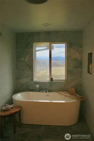 a view of a bathtub in a bathroom