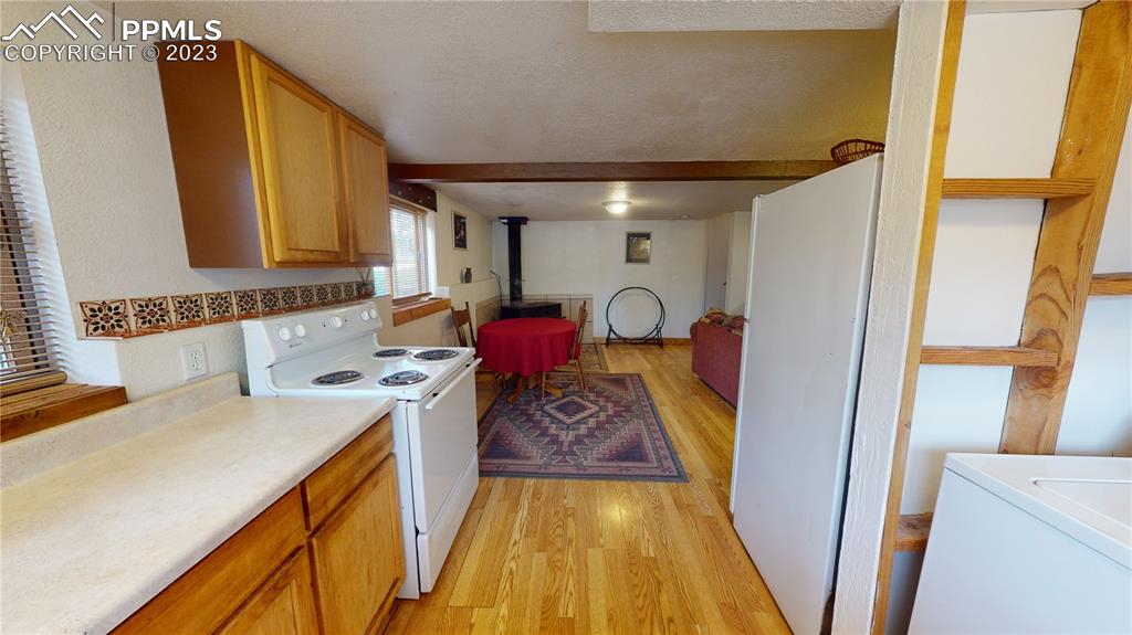 1011 Castle Ridge View Cripple Creek, CO 80813 - Photo 27 of 48 a bathroom with a sink and a mirror