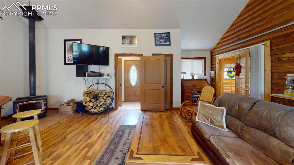 1011 Castle Ridge View Cripple Creek, CO 80813 - Photo 44 of 48 a living room with furniture and a flat screen tv