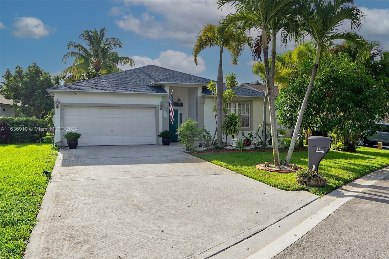 1274 Olympic Circle Greenacres, FL 33413 - Photo 2 of 34