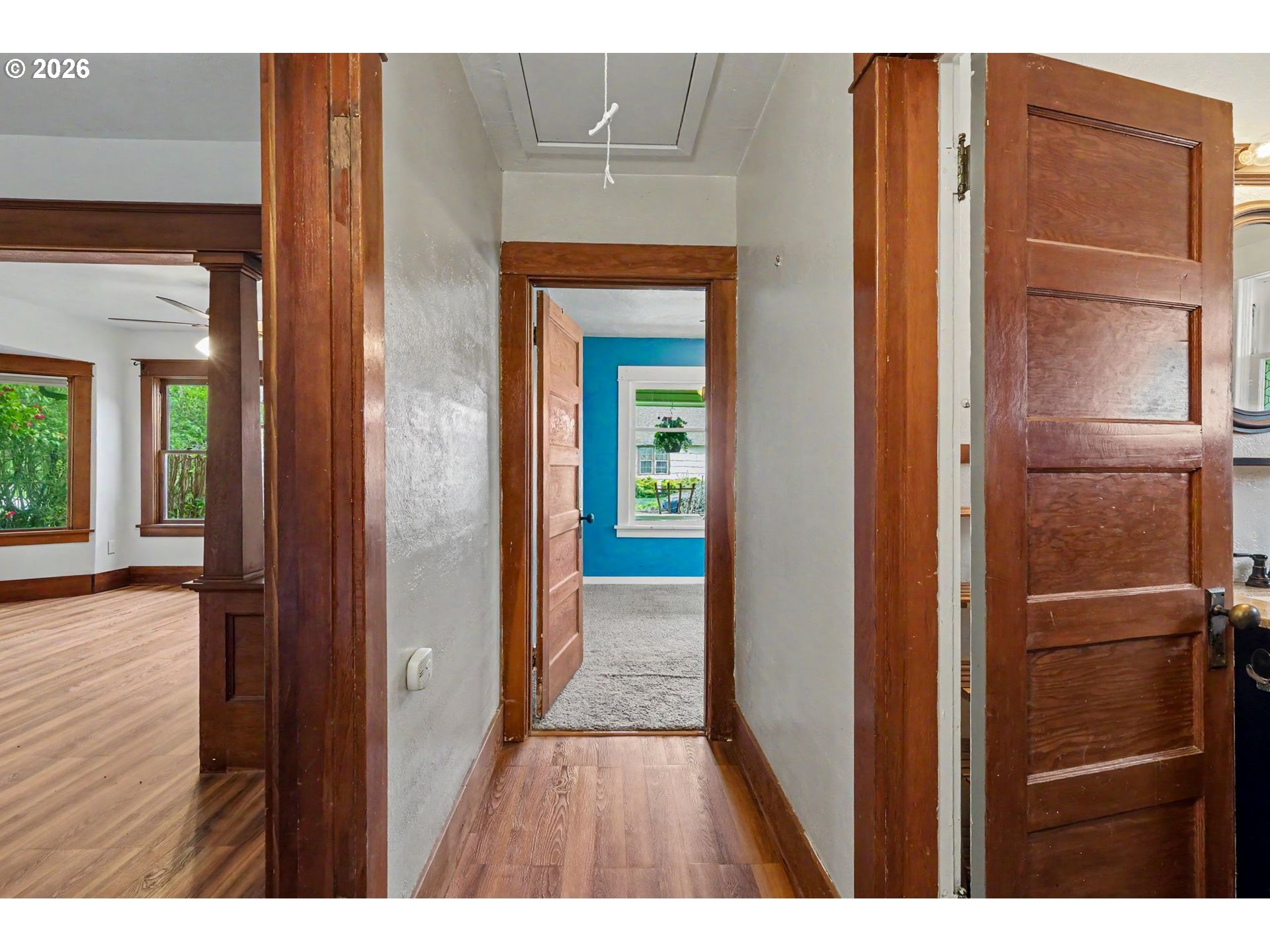301 Orchard Street Silverton, OR 97381 - Photo 22 of 42 a view of hallway with wooden floor