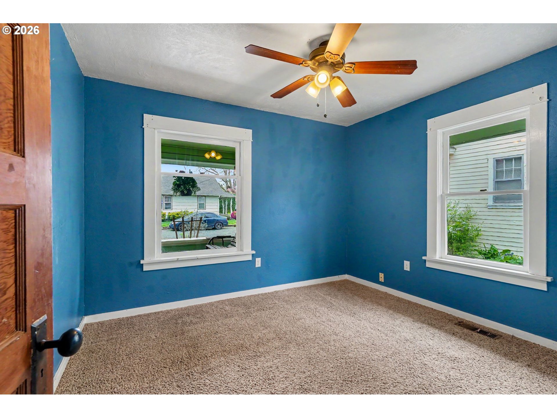 301 Orchard Street Silverton, OR 97381 - Photo 23 of 42 a view of an empty room and window