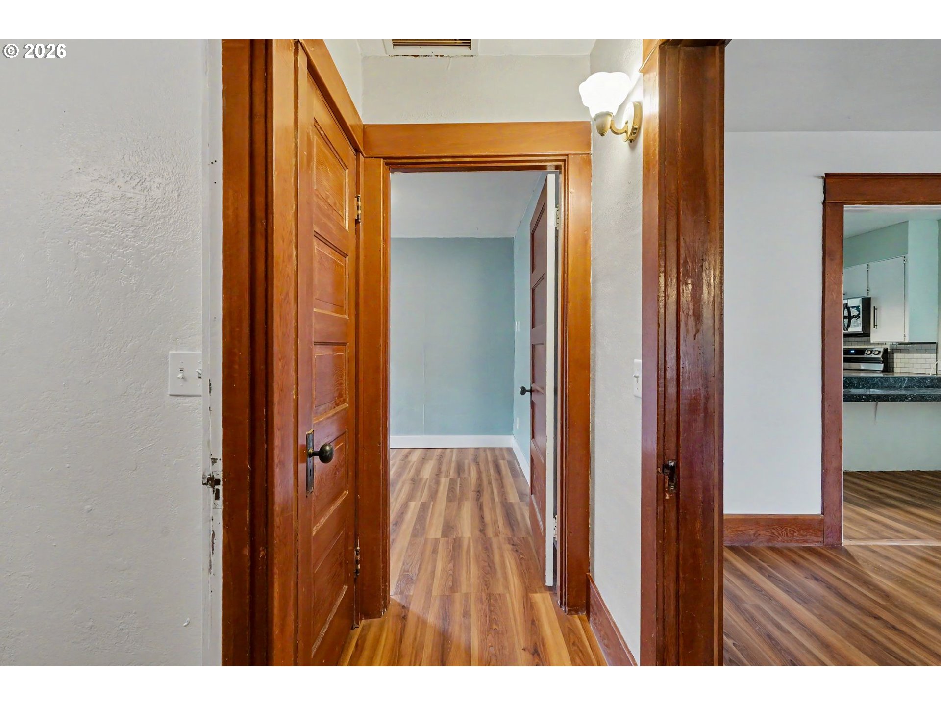 301 Orchard Street Silverton, OR 97381 - Photo 26 of 42 a view of hallway with wooden floor