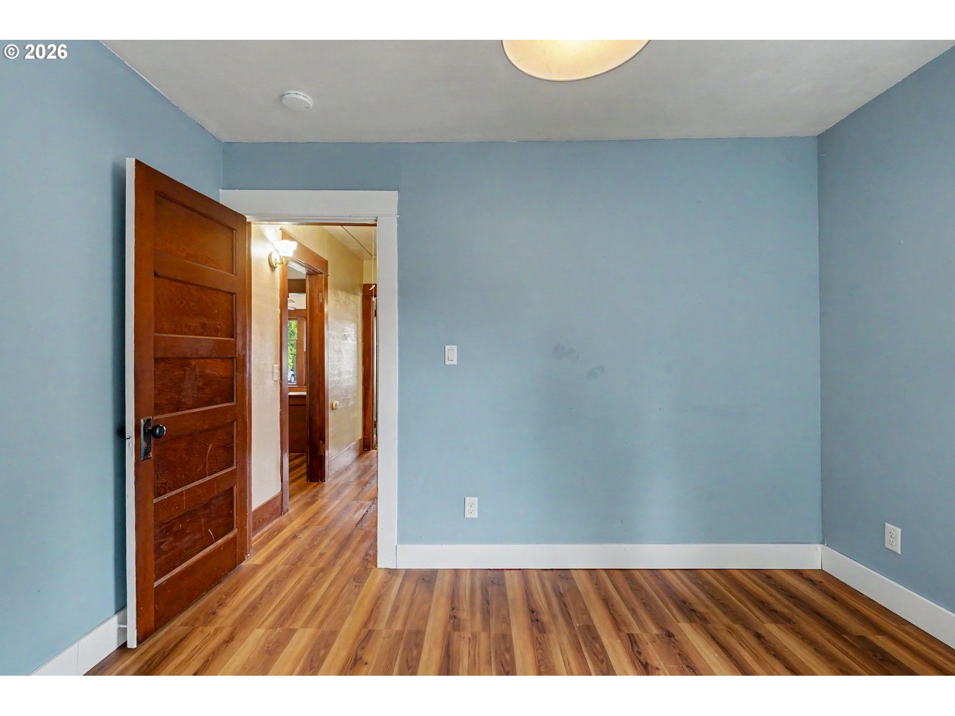 301 Orchard Street Silverton, OR 97381 - Photo 28 of 42 a view of empty room with wooden floor