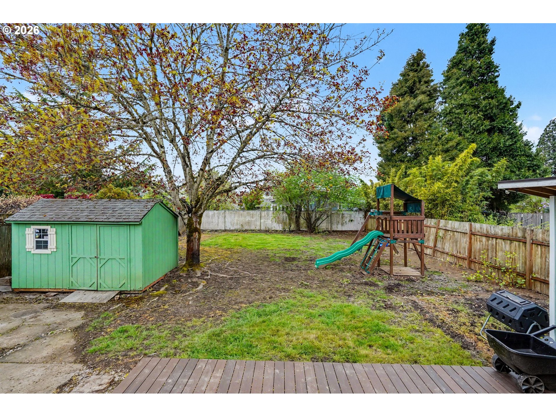 301 Orchard Street Silverton, OR 97381 - Photo 29 of 42 a view of a backyard with a slide