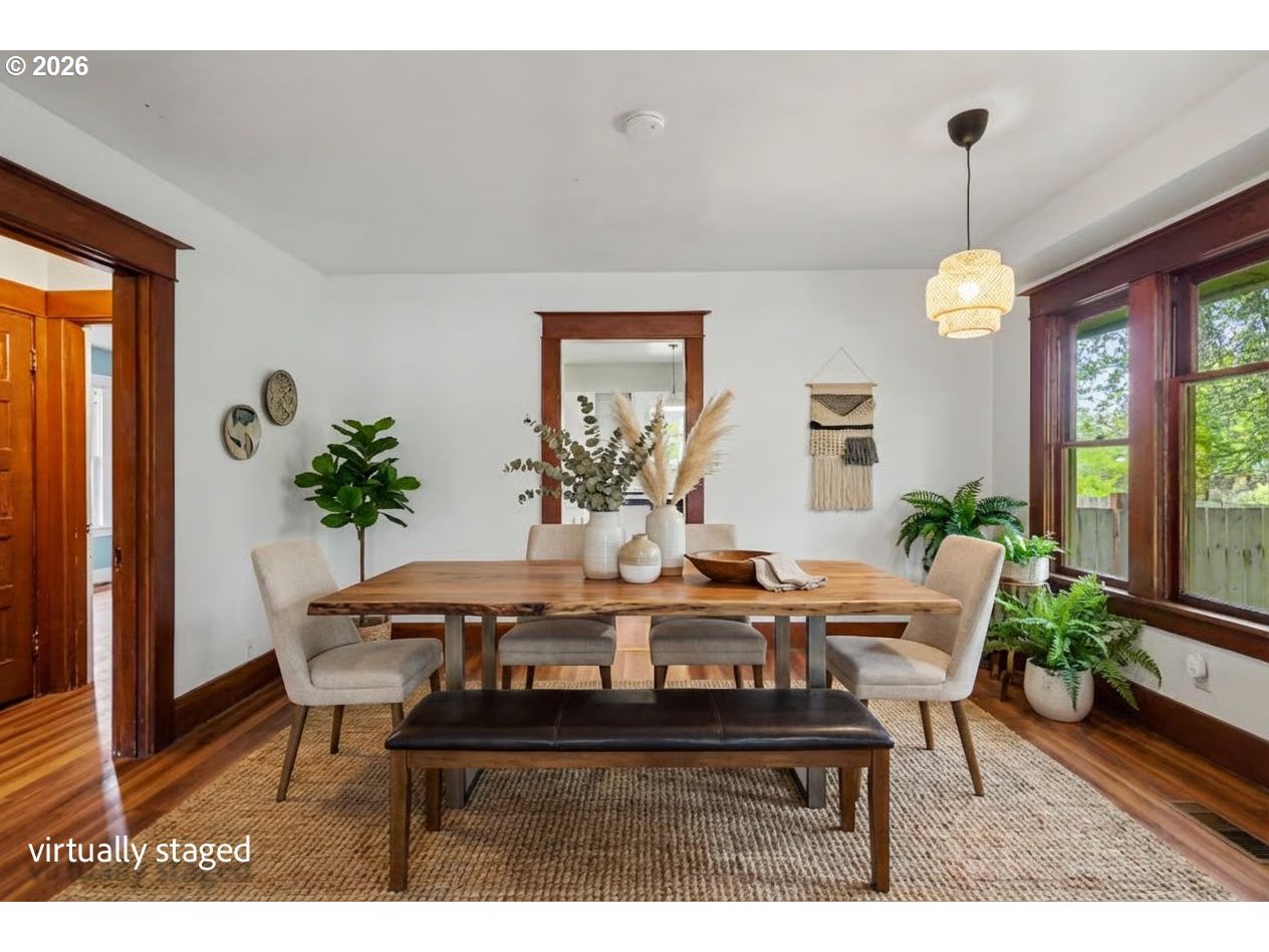 301 Orchard Street Silverton, OR 97381 - Photo 40 of 42 a view of a dining room with furniture window and wooden floor