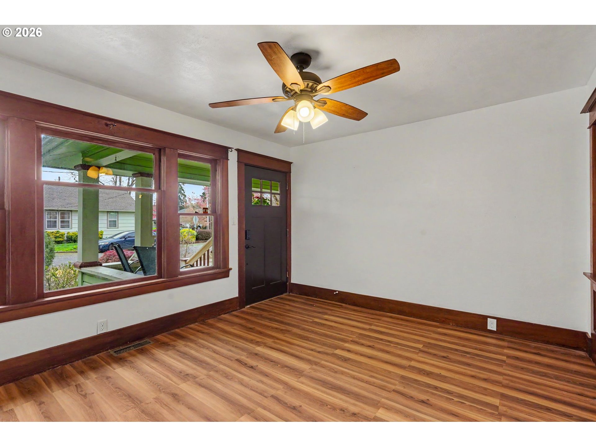 301 Orchard Street Silverton, OR 97381 - Photo 10 of 42 a view of an empty room with a window