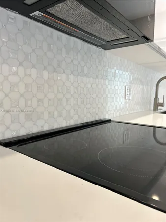 a view of a hallway with staircase